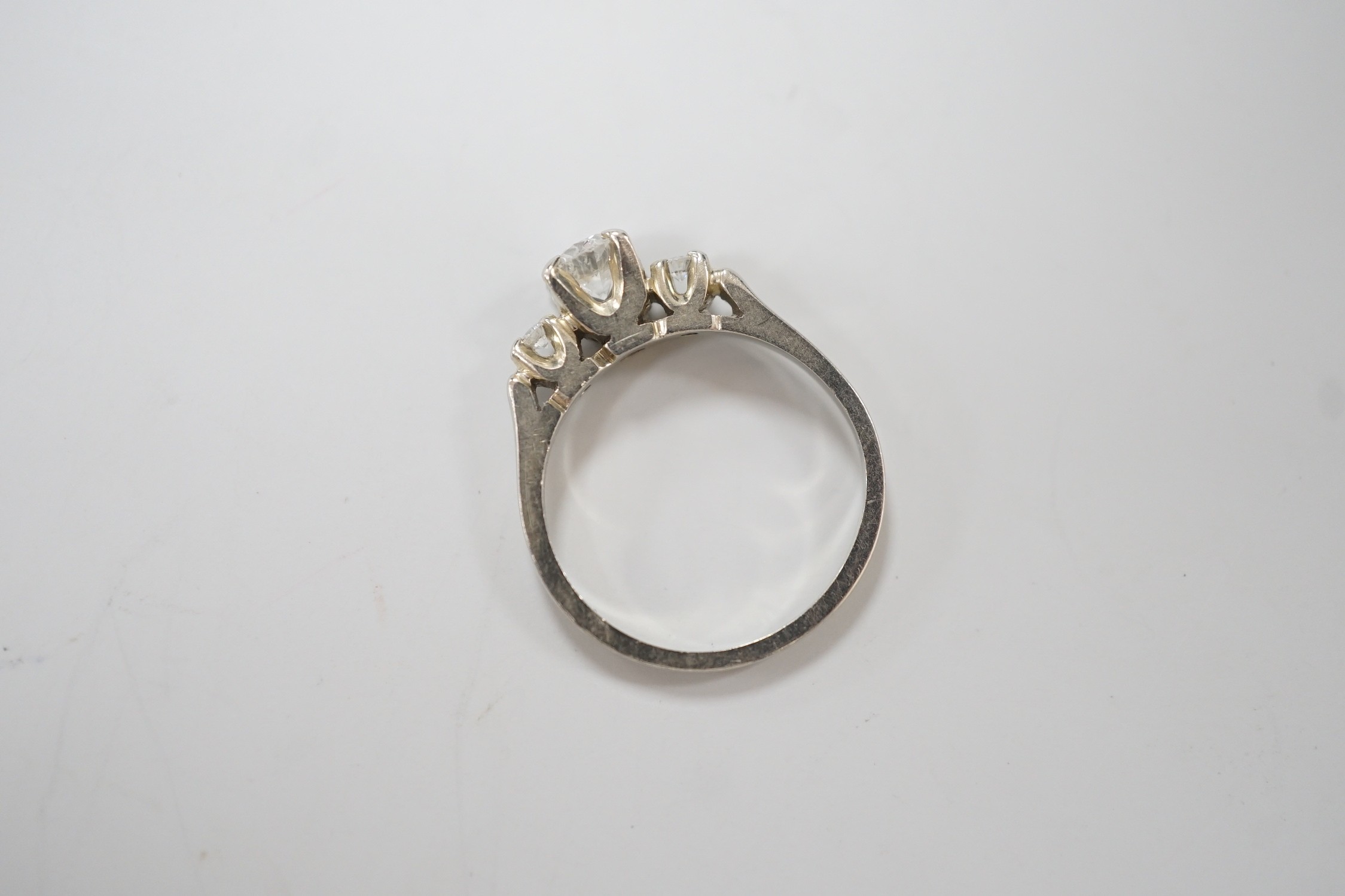 A Canadian Birks 18k white metal and single stone diamond ring, with diamond set shoulders, size H, gross weight 2.7 grams